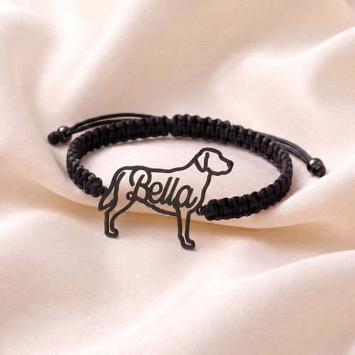 Custom pet bracelet with the dog's silhouette and name, black finish on a black braided cord